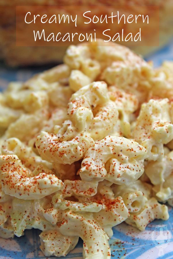 creamy southern macaroni salad on a blue and white plate