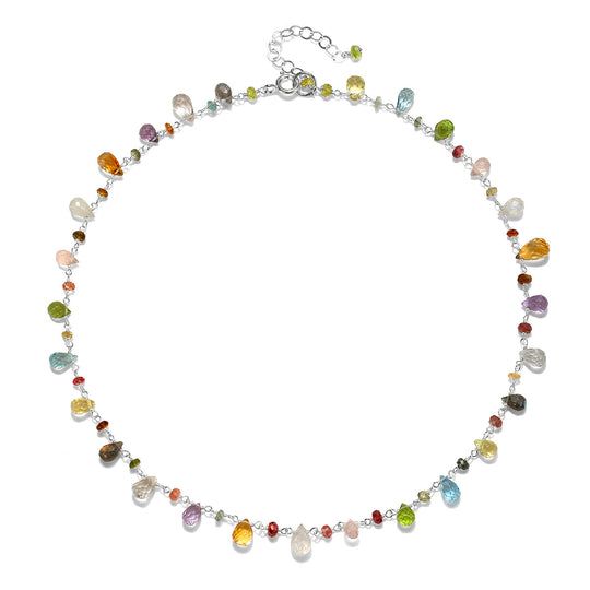 Semi-precious stones including garnet, rose quartz, citrine, peridot, sky blue topaz, amethyst, labradorite and moonstone are hand-wrapped in 14k gold dipped sterling silver with a peridot bezel set charm.  Toggle closure designed to wear in front, 18" total length and layers beautifully with our Wildflower Choker.  El Adjustable Tourmaline Gemstone Beads Jewelry, Dainty Multi-stone Sterling Silver Jewelry, Tourmaline Jewelry With Natural Stones For Jewelry Making, Dainty Sterling Silver Necklace With Gemstone Beads, Spiritual Tourmaline Gemstone Beads Jewelry, Tourmaline Briolette Jewelry With Natural Stones, Briolette Tourmaline Jewelry With Natural Stones, Sterling Silver Lariat Necklaces With Natural Stones, Sterling Silver Lariat With Natural Stones