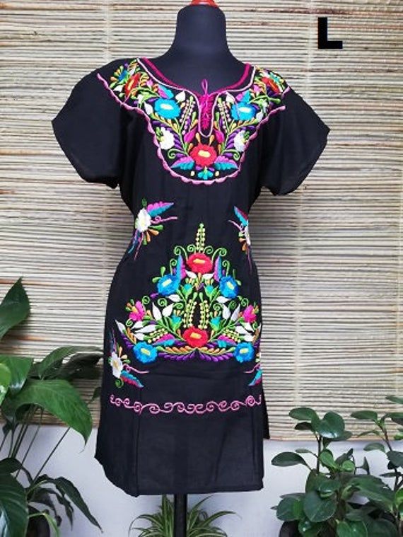 Beautiful dress embroidered with bright colors by artisans from the state of Oaxaca, to pour on any occasion. This dress has straps to adjust at the back. Each dress has a unique embroidery, so colors may vary. The short sleeveless and embroidered dresses hand, they are also beautiful, unique pieces. Mexican textile art has centuries of history and creativity throughout the country. Mexico is recognized as one of the leading countries with a beautiful artistic production in the textile world, mi Multicolor Folk Style Dress For Fiesta, Folk Style Multicolor Dress For Fiesta, Traditional Multicolor Floral Embroidered Dress, Folk Style Multicolor Festival Dresses, Beach Dresses With Multicolor Embroidery For Festivals, Traditional Multicolor Dress For Fiesta, Multicolor Embroidered Floral Dress, Beach Dress With Multicolor Floral Embroidery, Multicolor Embroidered Short Sleeve Dress For Fiesta