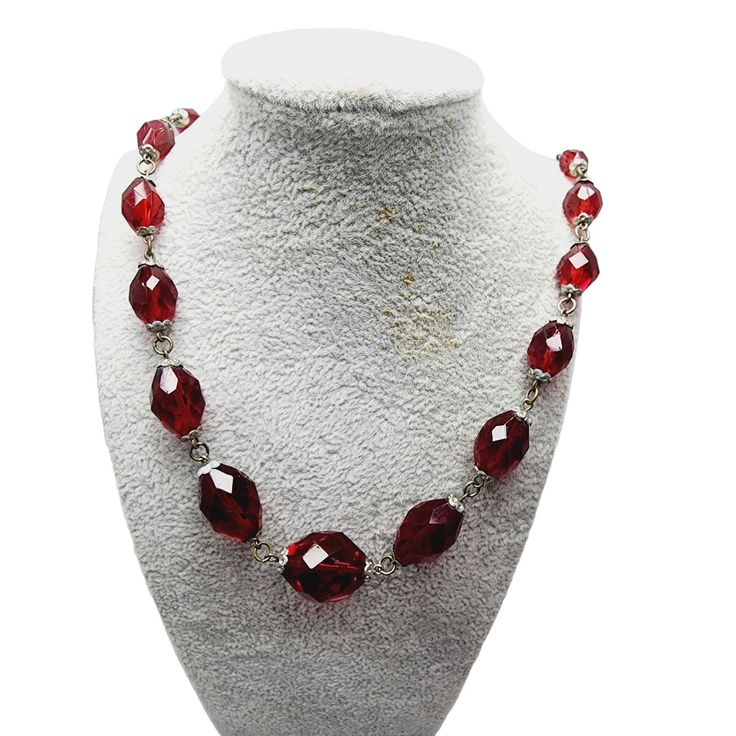 "Vintage Art Deco Red Crystal Necklace (A1079) Size: About 28\" Color: Red Condition: Fair to good vintage; Some of the crystals have imperfections and flea bites. Bead cap plating is not great. Era: Circa 1930s Signed: None Please look at all the photos, as they are part of the description. I try my best to point out any flaws. Also please remember this is a preloved piece and may show signs of light wear, marks, scratches, etc. I will be posting a lot more jewelry, Keep checking back." Formal Red Faceted Necklace, Red Round Crystal Jewelry, Formal Red Faceted Jewelry, Red Faceted Jewelry For Formal Occasions, Red Jewelry With Lobster Clasp For Party, Red Faceted Beads Costume Jewelry, Red Party Jewelry With Lobster Clasp, Red Crystal Beaded Necklaces For Party, Handmade Red Round Crystal Necklaces