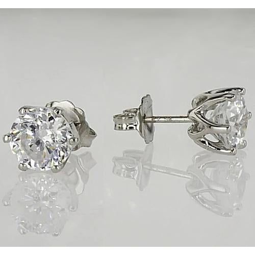 METAL SPECIFICATIONSWhite Gold 14KSTONE SPECIFICATIONSStone Name : DiamondStone Cut : RoundStone Details : There is one round cut diamond approx. 0.75 carats (Approx. Diameter 5.6 mm) in each earring. Natural earth mined diamonds. Approx. Age of Diamonds : Over a Billion years old Place of Formation : At depths between Round Diamond Stud Earrings, Diamond Earrings Studs Round, Stud Set, Diamond Stud Earrings, Stone Cuts, Stunning Earrings, Diamond Stud, Diamond Stone, Diamond Earrings Studs