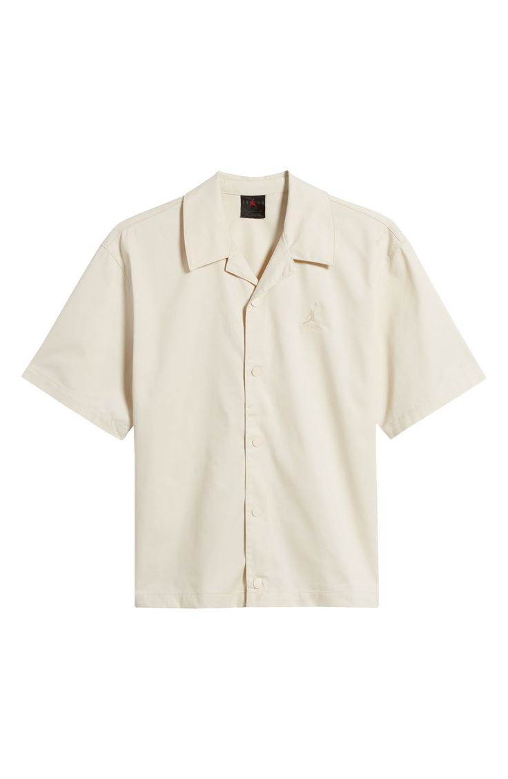 Roomy and relaxed, this camp shirt made with breathable cotton sports tonal front snaps and an enzyme wash that makes it look and feel like an old favorite. 27" length; 44" chest (size Medium) Front snap closure Notched collar Elbow-length sleeves 65% polyester, 35% cotton Machine wash, tumble dry Imported Nordstrom x Nike: A curated lifestyle destination where fashion is the ultimate sport Solid Camp Shirt With Camp Collar For Spring, Casual Solid Camp Shirt With Johnny Collar, Spring Solid Color Camp Shirt With Camp Collar, Solid Relaxed Fit Button-up Camp Shirt, Solid Relaxed Fit Camp Shirt, Solid Shirt With Relaxed Fit And Camp Collar, Solid Relaxed Fit Shirt With Camp Collar, Casual Solid Camp Shirt With Spread Collar, Solid Color Cotton Camp Shirt With Camp Collar