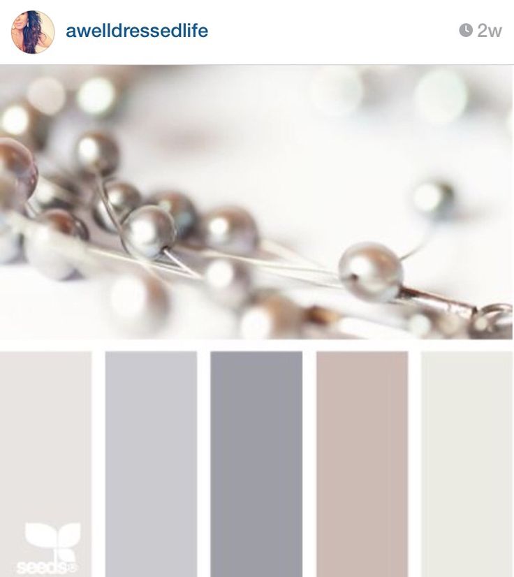 the color scheme is gray and white with silver beads on it, along with other colors