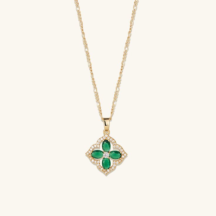 Expertly crafted with high-quality materials and finished with sparkling emerald gemstones, this necklace exudes elegance and sophistication. This necklace is different from regular gold plating because it has a thick layer of 18k Gold on Stainless Steel making it more durable, hypoallergenic, and waterproof. It offers the appearance and quality of gold jewelry at a more affordable cost. • Dipped in 18k Gold • Hypoallergenic & Waterproof Luxury Green Emerald Necklaces, Elegant Green Clavicle Chain Necklace, Elegant Green Gemstone Crystal Necklace, Luxury Green Necklaces With Sparkling Stones, Elegant Green Flower Pendant Necklaces, Green Long Necklace For Party, Elegant Green Rhinestone Necklace With Sparkling Stones, Elegant Emerald Clavicle Chain Necklace For Formal Events, Elegant Jewelry With May Birthstone Sparkling Stones