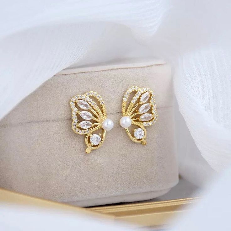 These stunning gold butterfly earrings will add the perfect touch of sparkle and elegance to your special event or even just everyday outfit! Made with high quality materials, these beautiful earrings will be sure to impress in person and in photographs. *Shipping: CANADA ORDERS: FREE SHIPPING TO CANADA. Sent WITHOUT TRACKING via Canada Post. Please allow 3-10 business days for them to arrive. US ORDERS: ORDERS are sent via Chit Chats with TRACKING. Please allow 3-5 business days for them to arr Elegant Butterfly Charm Earrings, Elegant Gold Earrings With Butterfly Charm, Elegant Butterfly Earrings For Formal Occasions, Elegant Hypoallergenic Butterfly Jewelry, Elegant Gold Butterfly Earrings, Elegant Gold Butterfly-shaped Earrings, Butterfly Cubic Zirconia Wedding Earrings, Wedding Butterfly Cubic Zirconia Earrings, Gold Butterfly Charm Earrings For Party