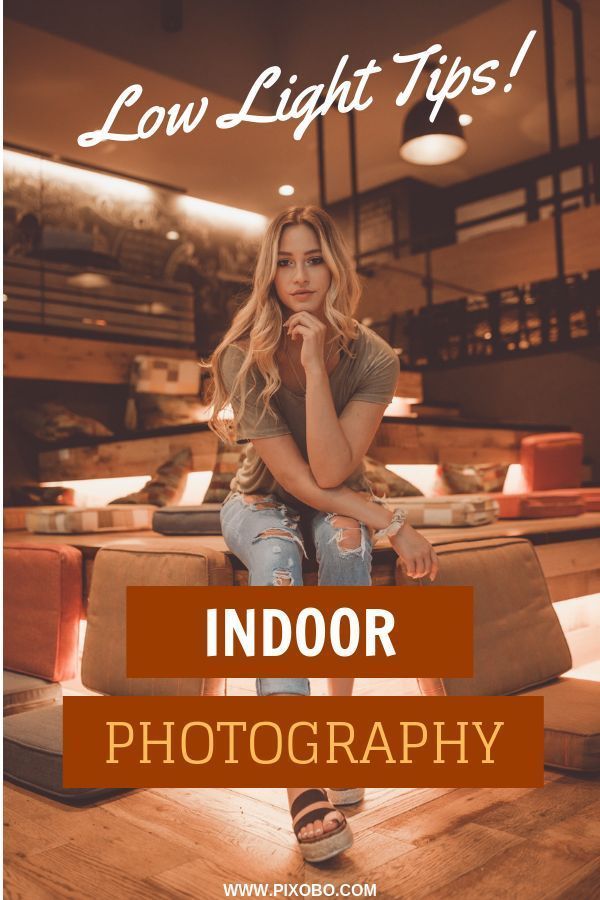 a woman sitting on top of a wooden floor in front of a window with the words, low light tips indoor photography