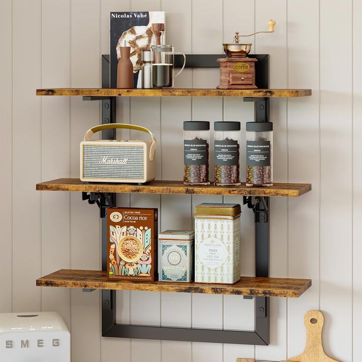 the shelves in the kitchen are filled with various items such as tea, coffee and cookies