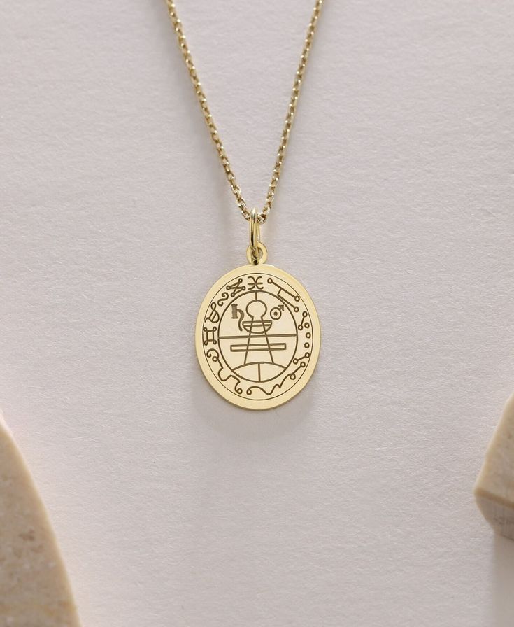 Gold  Gold Seal Of Solomon -Gold Seal Of Solomon Necklace ● Material of pendant: Solid Gold 14k ( REAL GOLD ) ● Metal Stamp: 14k ( REAL GOLD ) ● The pendant is available in 5sizes: - 12x17 mm / 0,47 x 0,66 inches - 13x18 mm / 0,51 x 0,70 inches  In the photos - 14x19 mm / 0,55 x 0,74 inches  - 16x21 mm / 0,62 x 0,82 inches  - 18x24 mm / 0,70 x 0,94 inches ( In the photos the size is 13x18 mm / 0,51 x 0,70 inches ) ( Jump Ring inner diameter: 4 mm ) ● Material of chain: Solid gold 14k ( REAL GOLD ) It is thin and dainty and it is available in 4 sizes: - 40 cm / 15,75 inches ( Length ) - 45 cm / 17,72 inches ( Length ) In the photos - 50 cm / 19,68 inches ( Length ) - 55 cm / 21,65 inches ( Length ) ● Backside engraving is FREE ( Please use the personalization box for that.) ● If you want la Symbolic Charms Necklaces For Commemoration, Symbolic Charms Necklace For Commemoration, Symbolic Oval Charm Necklaces, Symbolic Oval Necklaces With Charms, Spiritual Charms Necklaces For Commemoration, Commemorative Amulet Necklaces With Round Shape, Amulet Style Commemoration Necklace With Round Shape, Amulet Pendant Necklace For Commemoration, Symbolic Gold Jewelry For Birthday