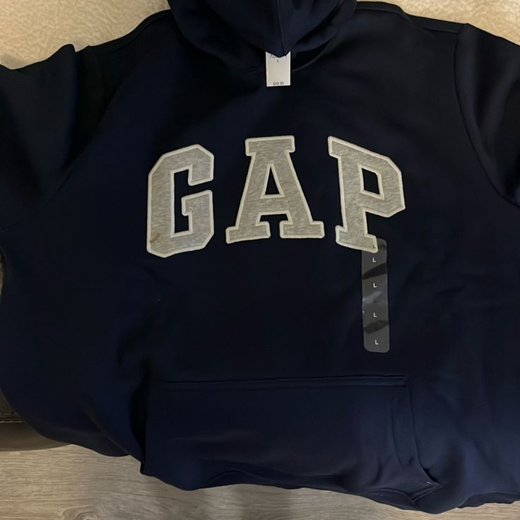 Brand New With Tags, Navy And Gray Gap Hoodie Gap Sporty Top With Drawstring Hood, Sporty Gap Top With Drawstring Hood, Gap Hoodie Sweatshirt With Adjustable Hood, Sporty Gap Tops With Letter Print, Gap Hooded Tops With Ribbed Cuffs, Gap Hooded Hoodie For Streetwear, Gap Sweatshirt With Adjustable Hood For Streetwear, Gap Hoodie With Adjustable Hood For Streetwear, Gap Hoodie With Letter Print For Fall