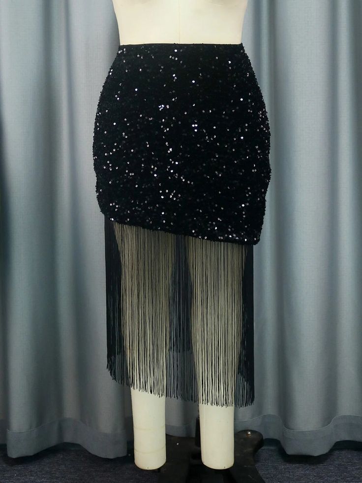 Introducing our dazzling 2023 Sequin Tassel Mini Skirt, the ultimate fashion choice for women seeking to make a statement in style. This skirt is a fusion of high fashion and playful elegance, designed for those who want to stand out at special occasions and parties.Our high-waisted mini skirt is adorned with shimmering sequins and playful tassels, creating a stunning and unique look that's perfect for dance nights, evening parties, or a night out on the town. The patchwork design adds a touch o Sequin Fringe Dress, Casual Work Dress, Party Bottoms, Party Jackets, Tassel Dress, Casual Bottoms, Casual Outerwear, Fringe Dress, Dress Cocktail