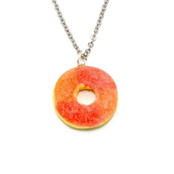 A Super cute and realistic Gummy Peach Ring charm has been handmade by me from polymer clay. They have a realistic "sugar" texture.  Charms measure about 1", total necklace length about 18". Choose between gold plated or surgical steel (hypoallergenic & non-tarnish) Chain.Matching earrings and keychain in my shop>> http://fatallyfeminine.etsy.com*These are made to order, please expect a 2 week delay from time of purchase until time of shipment.**Every order comes with free gift packagi Handmade Polymer Clay Kawaii Jewelry, Handmade Kawaii Polymer Clay Jewelry, Sweet Handmade Polymer Clay Jewelry, Sweet Handmade Resin Jewelry, Handmade Resin Jewelry In Sweet Style, Handmade Sweet Polymer Clay Jewelry, Handmade Sweet Resin Jewelry, Peach Items, Peach Ring