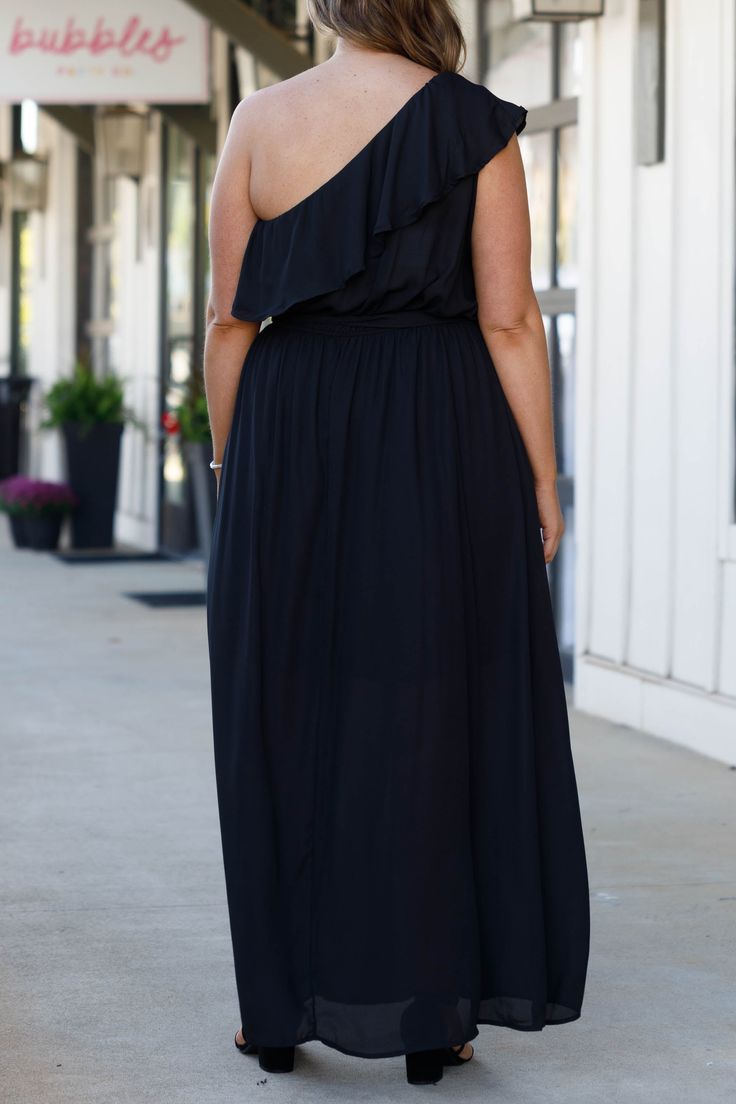 You'll look so fierce in this gorgeous dress! This dress has a beautiful black color with a flirty length and sleek material! This dress is perfect for any occasion, whether it is a plus on to a wedding or a fun holiday party! Style this dress with cute accessories and heels for a classy chic look! 100% Polyester Flirty Flowy Maxi Dress For Date Night, Long Chiffon Dress For Date Night, Spring Black Flowy Maxi Dress, Black Flowy Maxi Dress For Spring, Flowy Maxi Dress For Night Out, Flowy Maxi Dress For Party, Black Flowy Skirt Maxi Dress For Spring, Chic Flowy Dress For Date Night, Flowy Skirt Maxi Dress For Party