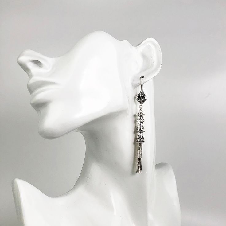 925 Sterling Silver Handmade Artisan Crafted Filigree Dangle Drop Tassel Earrings Material: 925 Solid Sterling Silver, 925 Stamped Earrings Length: 3.30 inches Width: 0.35 inches Finishing: Oxidized and Polished Comes with a gift pouch and box Free Domestic Shipping We hope that you enjoy our exclusive artisan handcrafted jewelry. Elegant Metal Jewelry With Tassels, Elegant Metal Tassel Jewelry, Elegant Metal Dangle Tassel Earrings, Elegant Dangle Tassel Earrings For Pierced Ears, Elegant Tassel Dangle Earrings For Pierced Ears, Elegant Silver Long Drop Tassel Earrings, Elegant Metal Tassel Earrings, Elegant Long Drop Tassel Earrings For Gift, Elegant Long Drop Tassel Earrings