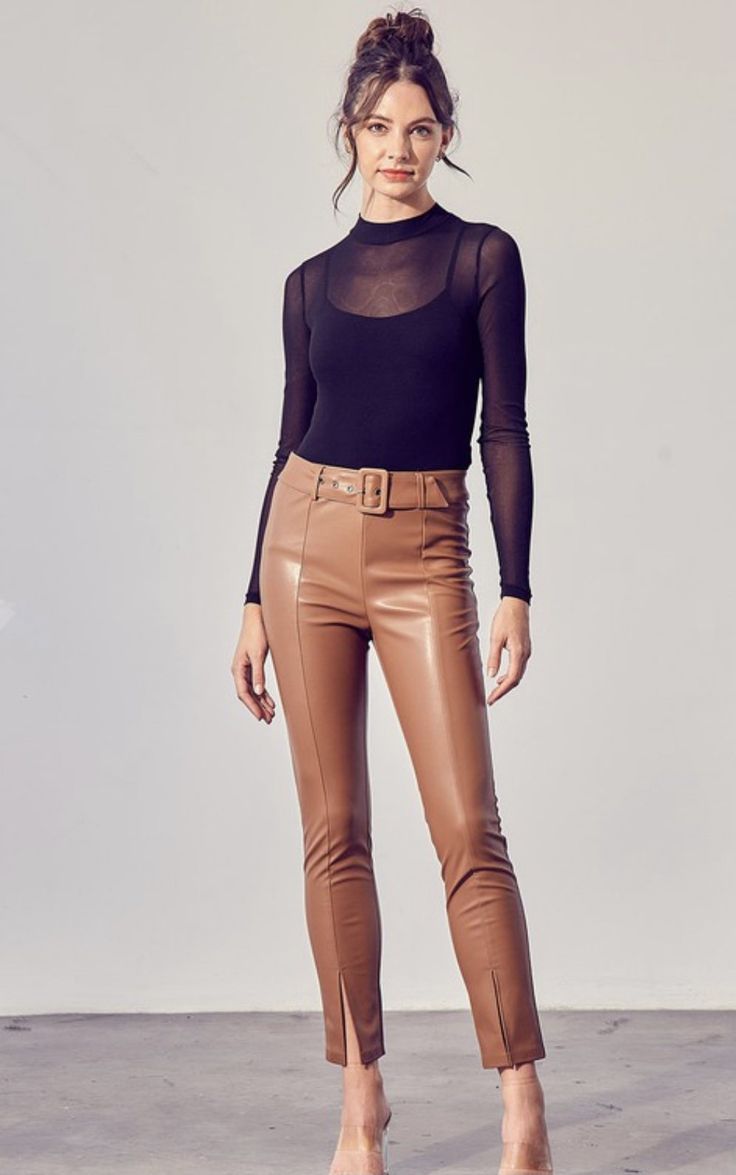 Leather self belted pants with adjustable belt. Slits in front to show still show your favorite pair of heels ! Belted High Waist Bottoms For Date Night, Chic Belted Bottoms For Date Night, Belted Bottoms For Date Night, High Waist Faux Leather Bottoms With Belt Loops, Party Faux Leather Belted Bottoms, Chic High-waisted Leather Pants With Belt Loops, Trendy Faux Leather Belted Bottoms, Sleek Faux Leather Pants With Belt Loops, Trendy Belted Faux Leather Bottoms