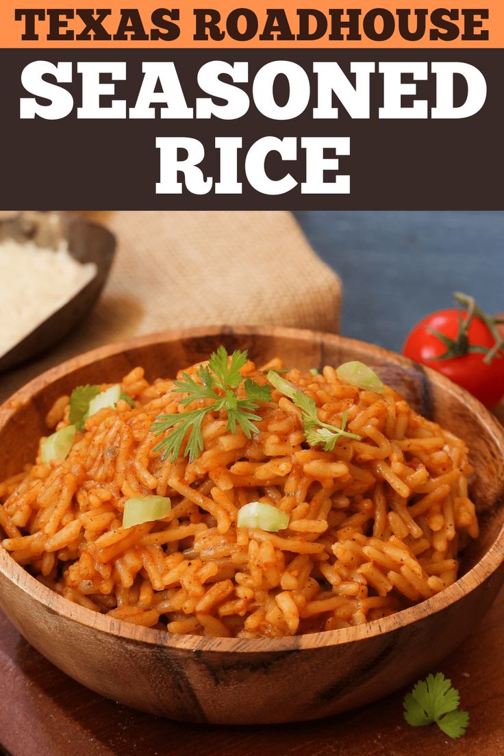 a wooden bowl filled with rice and garnished with cilantro on the side