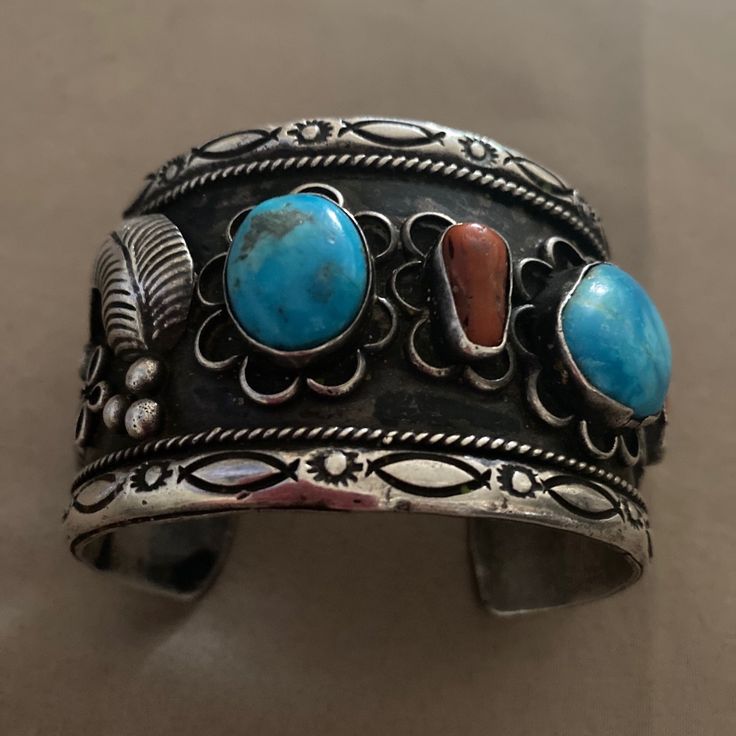 Navajo Sterling Silver Turquoise & Coral Vintage Cuff Bracelet Artisan Blue Cuff Bangle Bracelet, Artisan Blue Bangle Cuff Bracelet, Blue Multi-stone Bangle Jewelry, Blue Multi-stone Bangle, Southwestern Blue Cuff Jewelry, Southwestern Blue Cuff Bracelet As Gift, Blue Artisan Cuff Jewelry, Artisan Blue Cuff Jewelry, Southwestern Style Blue Bangle Bracelets