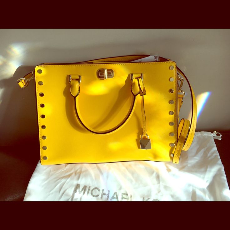 Yellow Crossbody With Gold Buttons Yellow Rectangular Bag With Branded Hardware, Yellow Rectangular Bags With Branded Hardware, Yellow Shoulder Bag With Branded Hardware, Yellow Shoulder Bag With Branded Hardware For Travel, Yellow Travel Bag With Branded Hardware, Yellow Leather Shoulder Bag With Branded Hardware, Yellow Crossbody Bag With Branded Hardware, Summer Everyday Shoulder Bag With Branded Hardware, Summer Shopping Bags With Branded Hardware