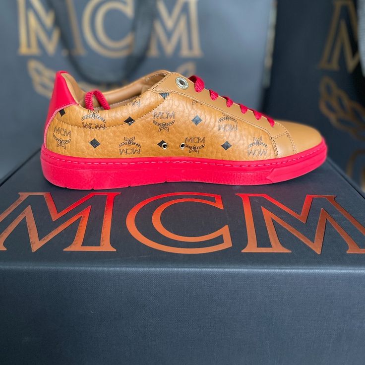 Mcm Terrain Lo Lychee Visetos Low Top Sneakers Euro Size 37 (Us 7) Insole Length 9.5 Inches. (See Pics For Details) The Signature Low-Top Sneaker, Embellished With Color-Coded Accents. - Red Grained Rubber Outsole With Embossed Mcm Logo - Brass Logo Plate On Padded Leather Tongue - Red Calf Leather Heel Tab - Mcm Logo Print On Footbed - Red Polyester Shoelaces - Calf Leather Trim - Visetos Monogram Coated Canvas - Metal Mcm Branded Eyelets - Calf Leather Lining - Made In Italy Model: Mes Csmm01 R0037 Color: Cognac/Lychee Mcm Shoes, Mcm Purse, High Cut Sneakers, Puma Tennis Shoes, Fur Sneakers, Chunky Trainers, Pink Sneakers, Mcm Logo, Bag Trends