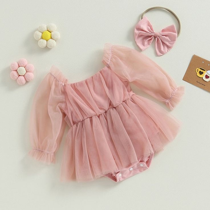 Dress your little one in style with these adorable baby girl rompers. Soft, breathable fabric keeps your baby comfortable all day long, while the endearing design is sure to turn heads. Your little one will look so cute and comfy you won't be able to resist giving her lots of cuddles! Perfect for spring and autumn, these rompers are a must-have for your baby girl's wardrobe. Made from a blend of soft cotton and durable polyester to keep your baby comfortable. Featuring a solid pattern and a clas Cute Solid Color Bodysuit For Playwear, Long Sleeve Bubble Romper For Summer Playwear, Cute Solid Color Playwear Bodysuit, Summer Long Sleeve Bubble Romper For Playwear, Playful Pink Long Sleeve Jumpsuits And Rompers, Playful Long Sleeve Pink Jumpsuits And Rompers, Cute Solid Bubble Romper For Spring, Cute Solid Color Bubble Romper For Spring, Cute Bodysuit For Spring