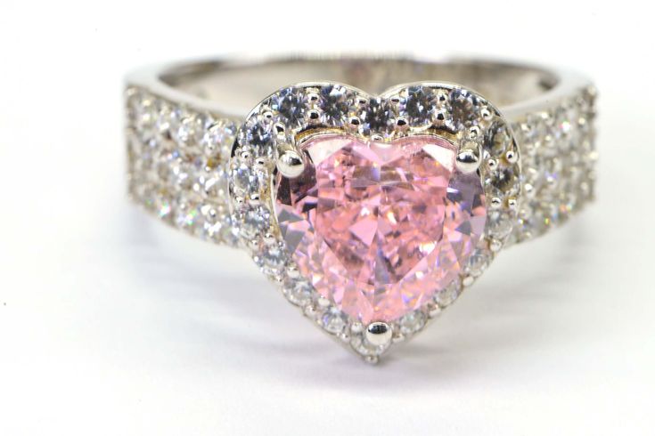 "this is very beautiful ring Sakura pink gems color 10mm diamond cut cubic zirconia 3 ct embellished Halo style 1mm CZ All sparkly running shiny stone crafted ring on sterling silver finished rhodium size : choose in option ( to resize ring take 5-6 day) In prestine clean , like new never wear Absolutely stunning gorgeous ring , Wonderful gift idea for you fiancé or wife . Ring will send in jewelry box explanation about gemstone : I write this note because I see a lot of people used in descripti Glamorous Pink Jewelry For Anniversary, Elegant Cubic Zirconia Crystal Ring For Valentine's Day, Elegant Crystal Ring With Cubic Zirconia For Valentine's Day, Pink Cubic Zirconia Jewelry For Valentine's Day, Valentine's Day Cubic Zirconia Diamond Ring With Accents, Dazzling Cubic Zirconia Jewelry For Proposal, Dazzling Rings For Valentine's Day With High Clarity, Cubic Zirconia Rings With Diamond Accents For Valentine's Day, Pink Cubic Zirconia Heart Ring With Prong Setting