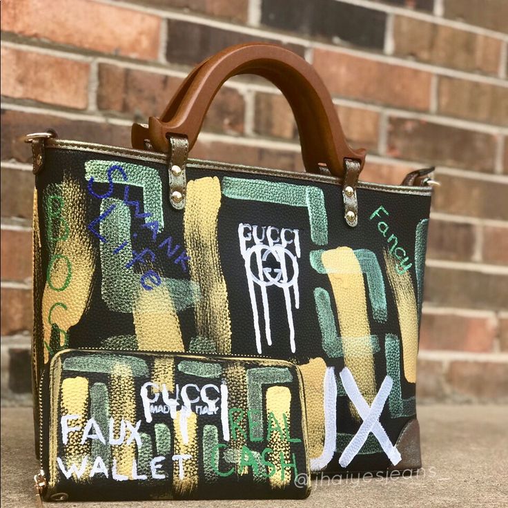 Vegan Leather Handbag With Custom Hand Painted Designs. Wooden Handles. Very Bold And Exclusive Fashion Statement. Perfect If You Never Want To Blend In! Price Includes Custom Handbag And Wallet. Pick 3 Sale!! Any 3 Sale Items Are 60% Off! Any 3 Regular Priced Items 40% Off! @ Www.Jhaiyesjeans.Com Custom Handbag, Painted Handbag, Hand Painted Designs, Custom Handbags, Handpainted Bags, Pick 3, Painted Designs, Fancy Bags, Custom Hand Painted