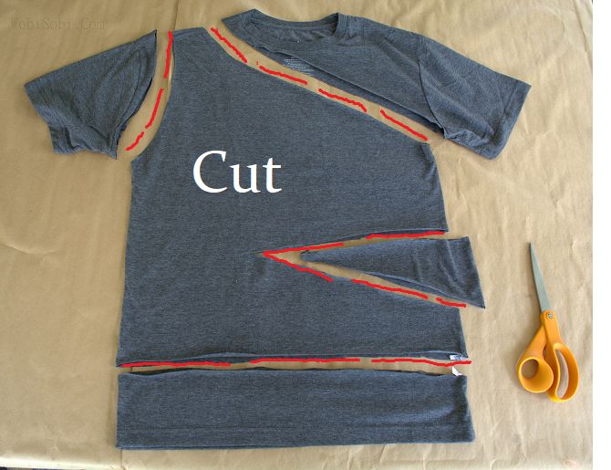 scissors and t - shirt with cut on it