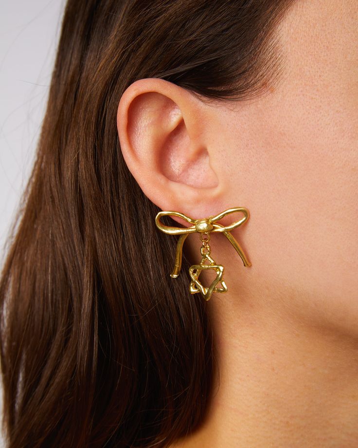 A Mensch is a very elegant person and my oh my if these earrings aren't the most elegant! Our lovely hand crafted bronze bow with a twinkling jewish star below. How Menschy! Sold as a pair. Drop: 1" All jewelry is made by hand to order. Jewelry will ship 2-3 weeks from the order date (if not sooner!) The Spanish Inquisition, Susan Alexandra, Spanish Inquisition, Star Of David Necklace, Gay Pride Gifts, Jewish Star, Pride Gifts, Star Of David, Nail Accessories