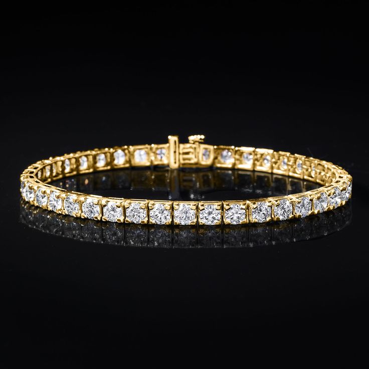 Ross-Simons - 11.50ct t. w. Lab Grown Diamond Tennis Bracelet in 14kt Yellow Gold. 8". Exceptional in every way, our ample 11.50 ct. t. w. round brilliant-cut lab-grown diamond tennis bracelet is a true stunner. The classic style shines in gleaming 14kt yellow gold and finishes with a single-latch safety and push-button clasp. Lab-grown diamonds are identical to mined diamonds according to their optical, physical and chemical properties. All Ross-Simons lab-grown diamond jewelry in 14kt gold and Physical And Chemical Properties, Diamond Birthstone, Diamond Tennis Bracelet, Fine Jewelery, Tennis Bracelet Diamond, Tennis Bracelet, Push Button, 14kt Gold, Round Brilliant