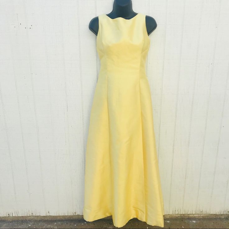 Beautiful Vintage Yellow Floor Length Formal Dress / Gown By Neiman Marcus. No Fabric Label But Feels Like Silk To Me. Stains Under Arm And On Back (See Pics) Zips Up Back With Plastic Zipper. Scoop Neck. All Measurements Taken Flat: Bust - 15 Inches Waist - 12 Inches Hip - 16 Inches Length - 50 Inches ****Cat Friendly Home Spring Silk A-line Gown, Yellow Gown For Spring Wedding, Spring Yellow Wedding Gown, Yellow Spring Wedding Gown, Yellow Sleeveless Gown With Fitted Bodice, Spring Cocktail Maxi Dress In Classic Style, Yellow Gown With Fitted Bodice Sleeveless, Yellow Silk Formal Gown, Fitted Sleeveless Summer Gown