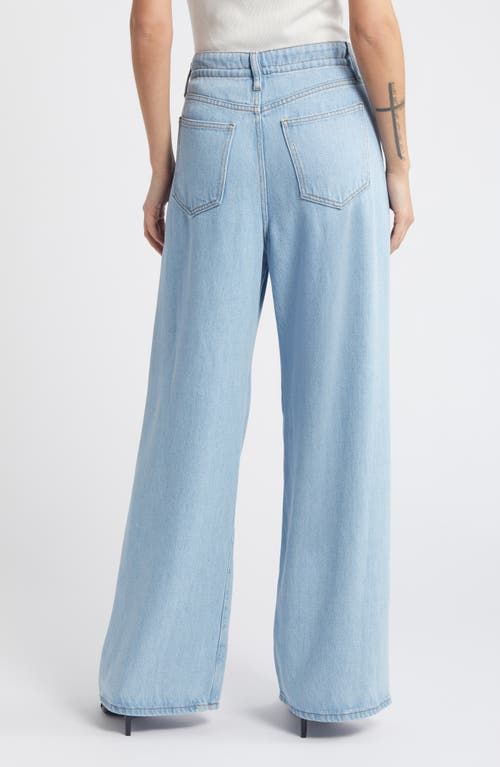 "Find FRAME Super Drape Wide Leg Denim Drawstring Pants on Editorialist. A less structured way to wear denim, these light and flowy pants keep you comfy with a drawstring waistband and full-length wide legs. 30\" inseam; 24\" leg opening; 12 1/2\" front rise; 15\" back rise (size 29) Elastic/drawstring waist Front scoop pockets; back patch pockets 100% lyocell Machine wash, dry flat Imported" Wide Leg Denim Bottoms With Drawstring, Light Wash Wide-leg Cotton Bottoms, Wide-leg Denim Bottoms With Drawstring, Blue Drawstring Wide-leg Bottoms, Pre-washed Denim Blue Wide Leg Bottoms, Latest Jeans, Comfy Jeans, Cotton Linen Pants, Flowy Pants