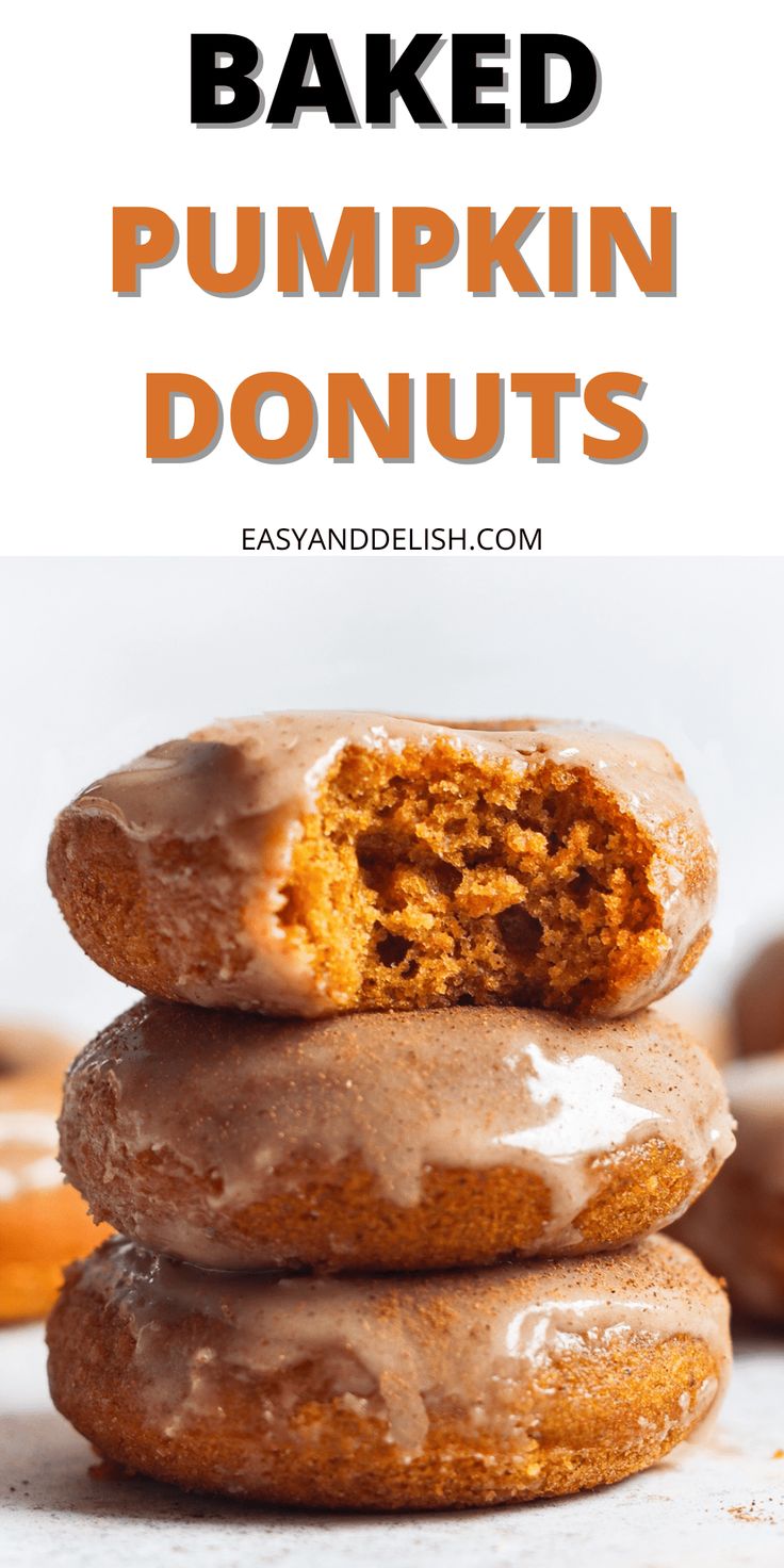 three glazed pumpkin donuts stacked on top of each other with the words baked pumpkin donuts