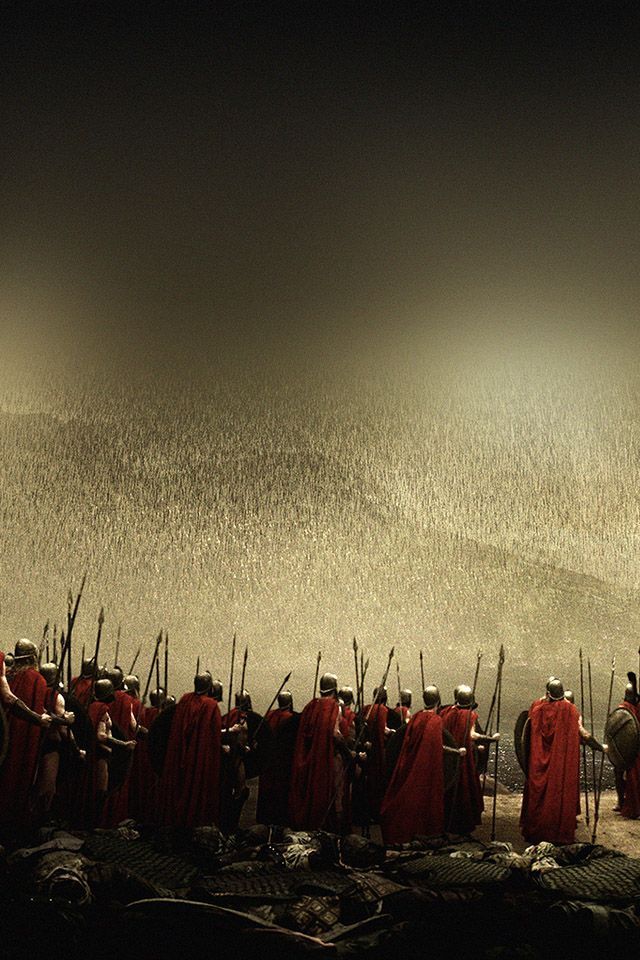 a group of men dressed in red standing next to each other