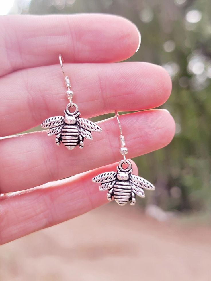 Sterling silver hooks. Bee is 1x2cm Mom And Baby Elephant, Feather Earrings Silver, Elephant Earrings, Crescent Moon Earrings, Silver Feather, Cat Earrings, Moon Earrings, Feather Earrings, Cute Earrings