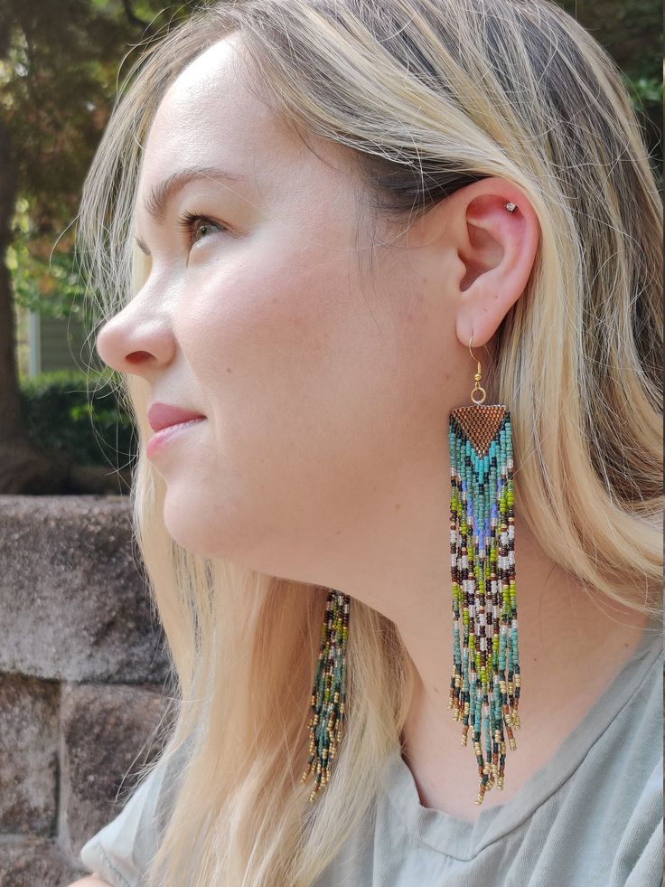 Festival Beaded Fringe Long Drop Earrings, Handmade Bohemian Long Drop Earrings, Festival Long Drop Beaded Fringe Earrings, Beaded Fringe Long Drop Earrings For Festivals, Long Drop Beaded Fringe Earrings For Festivals, Bohemian Linear Earrings, Bohemian Dangle Linear Earrings, Bohemian Brown Beaded Tassel Earrings, Handmade Bohemian Dangle Linear Earrings