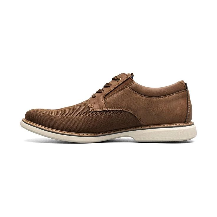 The Nunn Bush Otto knit plain toe oxford features a stylish upper and athletic inspired sole. The modern style is complemented by the comfort of our Flex technology and lightweight outsole. A versatile and casual shoes, the Otto pairs well with any of your favorite outfits..Defender repellant powered by Scotchgard for enhanced water-resistance and stain protection.Breathable, fully padded mesh linings for exceptional moisture management and 360-degree padding.Molded, removable EVA with memory foam footbed that absorbs the pressure of each step and provides all-day comfort.Engineered Knit and Man-Made Upper.Wipe Clean.Imported Business Casual Lace-up Shoes With Cushioned Footbed, Casual Oxfords With Cushioned Footbed And Plain Toe, Casual Synthetic Oxfords With Rubber Sole, Casual Plain Toe Oxfords With Cushioned Footbed, Casual Wingtip Oxfords With Cushioned Footbed, Casual Synthetic Wingtip Oxfords, Casual Oxfords With Branded Insole, Casual Sneakers With Brogue Detailing For Business Casual, Casual Oxfords With Textured Sole And Plain Toe