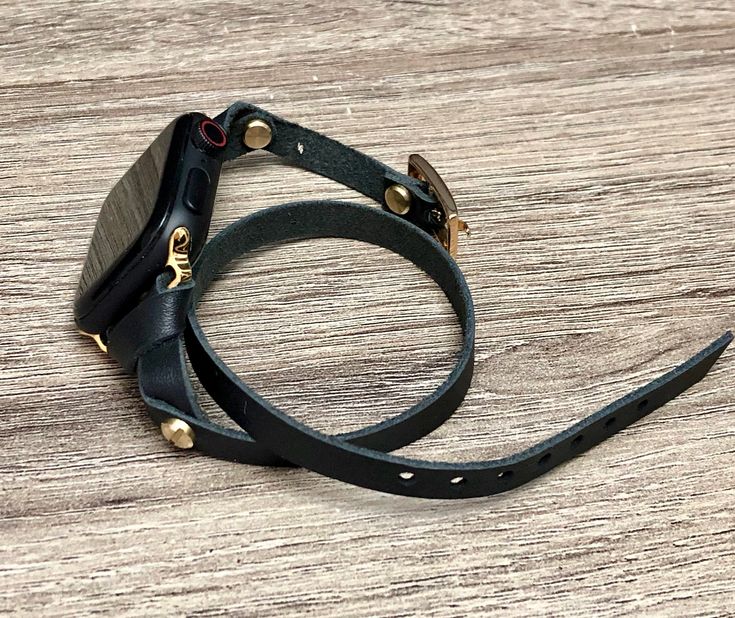 Make a Fashion Statement Every Place You Go! Get Tons of Compliments Wearing Your Beautiful Bracelet BE DIFFERENT! BE UNIQUE Double Wrap 7mm Genuine Leather Strap with Adjustable Buckle Designed And Handmade by Simeon D Jewelry Studio Adjustable Size Bracelet Perfectly Tailored to Fit Your Wrist This Bracelet Fits ALL Apple Watch Series Not For Other Models. Apple Watch Is NOT Included Follow my Studio on Social Media for Updates & New Designs Black Bracelet Strap Apple Watch Band For Everyday, Adjustable Black Bracelet Strap Watch Bands, Black Bracelet Strap Apple Watch Band As Gift, Adjustable Rectangular Jewelry With Leather Strap, Adjustable Black Watch Band With Wrist Strap, Rectangular Adjustable Watch Band For Gifts, Adjustable Wrist Strap Watch Bands, Rectangular Adjustable Watch Band As Gift, Black Adjustable Rectangular Watch Bands