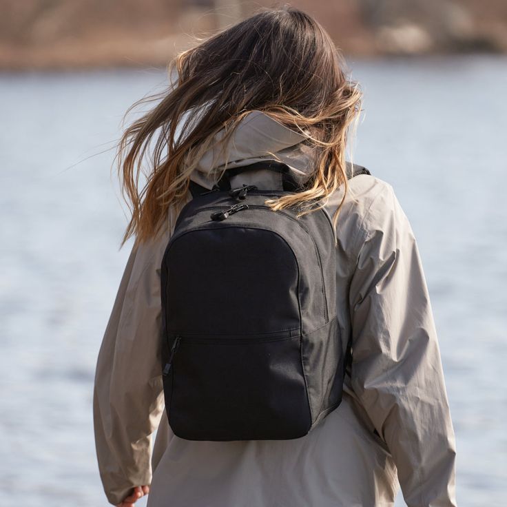 A lightweight laptop backpack made from eco-friendly materials. Features stash pockets, a sleeve for your suitcase handle, and a removable insert that features tons of pockets and dedicated compartment/pocket for a 13" laptop. Lightweight Travel Backpack, Suitcase Handle, Laptop Briefcase, Unisex Backpack, Laptop Tote, Duffel Bag Backpack, Weekender Tote, Overnight Bag, Laptop Backpack