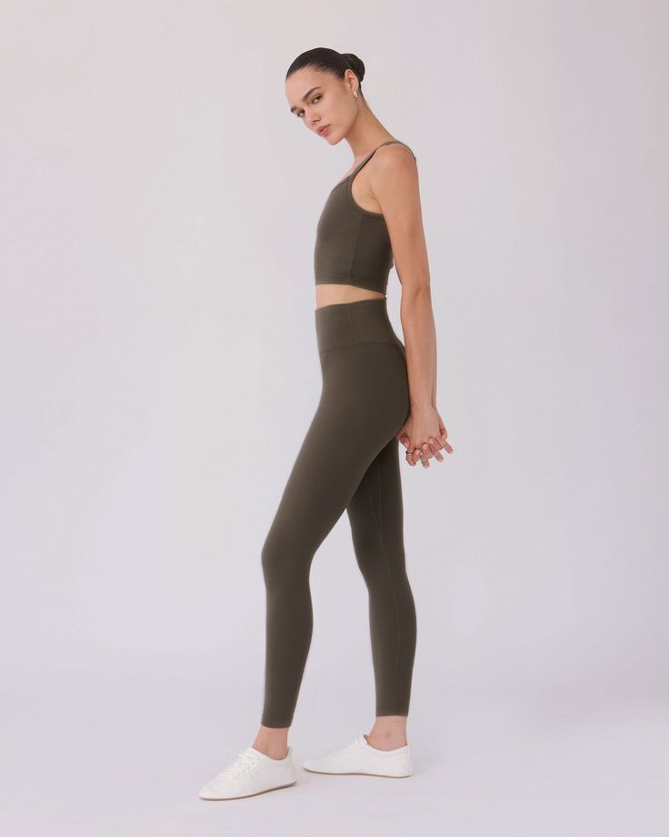 The SARA TOP in ASH is made with Nylora's signature 4-way stretch rib fabric, providing both comfort and style. The open back detail adds a touch of unique design, while the built-in shelf bra with removable padding offers support and versatility. Perfect for any active lifestyle. DETAILS: Open back detail top Nylora's signature 4-way stretch rib fabric Built-in shelf bra with removable padding 77% Nylon, 23% Spandex Machine wash SIZE & FIT: Fits true to size Length: 10" Bust: 14 1/4" Bottom: 12 Versatile High Stretch Elastane Sports Bra, Gym Activewear With Built-in Bra And Minimal Stretch, Versatile Light Support Elastane Sports Bra, Versatile High Stretch Activewear With Built-in Bra, Versatile Elastane Sports Bra For Pilates, Light Support 4-way Stretch Elastane Sports Bra, Modern Stretch Sports Bra With Built-in Bra, Versatile Fitted Sports Bra With Built-in Padding, Activewear With Built-in Bra For Workout