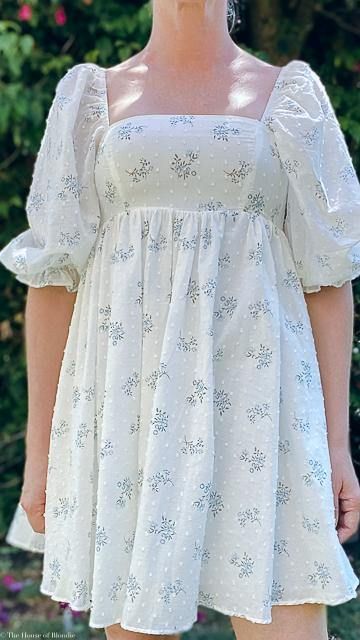 This romantic Floral Puff Sleeve Mini Dress with a bouquet floral print is perfect for summer days ~ Boutique clothing for elegant, feminine women featuring classic wardrobe essentials & more. Puffy Sleeve Dress, Classic Wardrobe Essentials, Swiss Dot Fabric, Wedding Dress Patterns, Puff Sleeve Mini Dress, Feminine Women, Elegant Feminine, Blue Wedding Dresses, Pretty Clothes