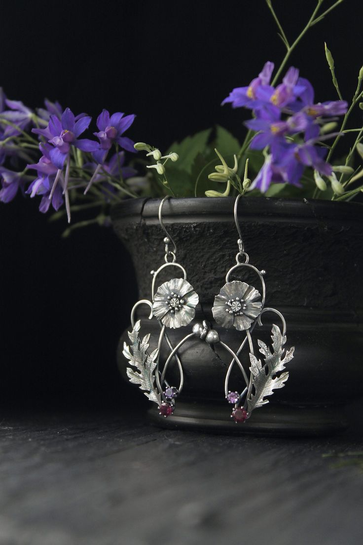 ITEM DESCRIPTION: Size H 65 x W 25 mm (2 1/2 x 2/3 inches) with closure. Weight - 4 g of each other. I made these botanical earrings of sterling silver, rhodolite and amethyst. This is very delicate and detailed work. These summer flowers look really elegant and amazing in silver. You can order these earrings with different gems. If you do not see your favorite version there, please write to me in convo and we will discuss your order. Jewelry will come to you in a gift box - ready for gifting. M Silver Botanical Earrings As Gift, Silver Botanical Earrings For Gift, Botanical Silver Earrings For Gift, Botanical Style Silver Earrings For Gift, Elegant Hand Forged Silver Earrings, Elegant Hand-forged Silver Earrings, Nickel-free Flower-shaped Jewelry For Jewelry Making, Sterling Silver Flower-shaped Jewelry With Matching Earrings, Botanical Style Jewelry With Matching Dangle Earrings