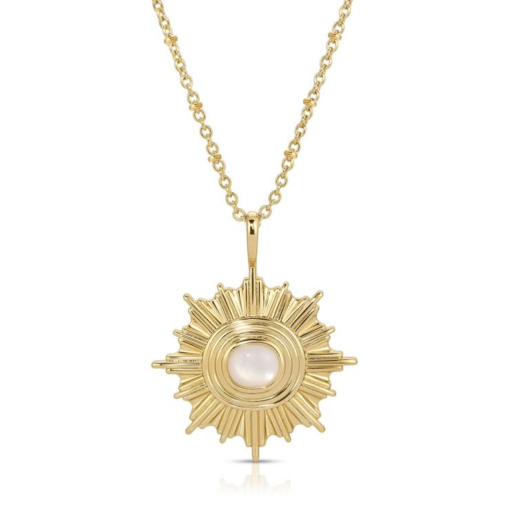 This Modern Supernova Pendant, with its gemstone center, will make you feel like the star of the show. Shimmer and shine with Mother of Pearl and Gold, hanging from a satellite chain. It's a stellar accessory that will elevate any outfit. 14k gold plated brass 25mm charm 17 inch chain with 2 inch extender genuine mother of pearl stone Questions about Shipping & Returns? Celestial Gemstone Brass Jewelry, Celestial Brass Gemstone Jewelry, Celestial Brass Jewelry With Gemstones, Celestial Gold Gemstone Jewelry, Gold Celestial Necklace With Polished Finish, Celestial Star-shaped Jewelry With Polished Finish, Celestial Yellow Gold Tarnish Resistant Jewelry, Celestial Style Yellow Gold Tarnish Resistant Jewelry, Celestial Style Yellow Gold Tarnish-resistant Jewelry