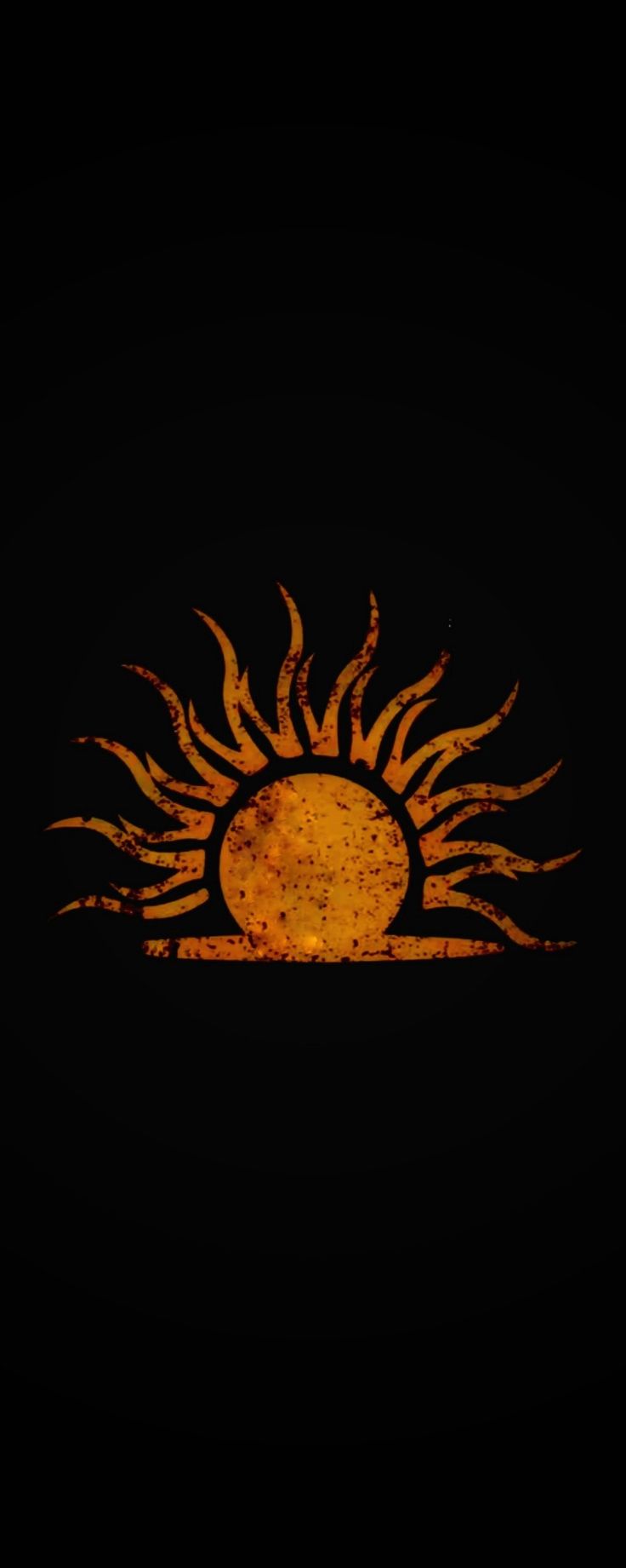 an orange and yellow sun on a black background with the word's name below it