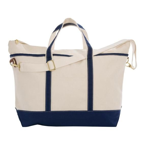 As their name implies, our Boat Weekenders are excellent for your weekend get-away. These heavyweight canvas bags have beautiful details like shiny brass fittings and leather tabs. A perfect carry-on, these bags have zippered tops so nothing will spill out and there are multiple inside pockets as well. An adjustable shoulder strap makes it easy to carry. Adjustable shoulder strapLeather and brass details Made of 20 oz. super heavy canvasMeasures 13" x 24" x 7" Floating Boat Docks, Wooden Boat Plans, Diy Boat, Boat Building Plans, Luggage Store, Photo Organization, Boat Dock, Boat Plans, Travel Duffel