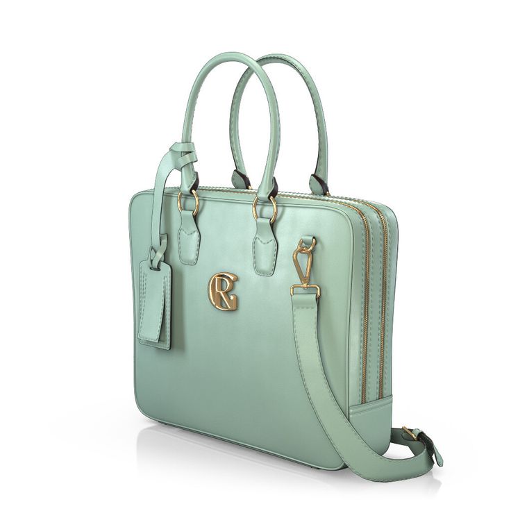 a mint green purse with two handles and a gold monogrammed logo on the front