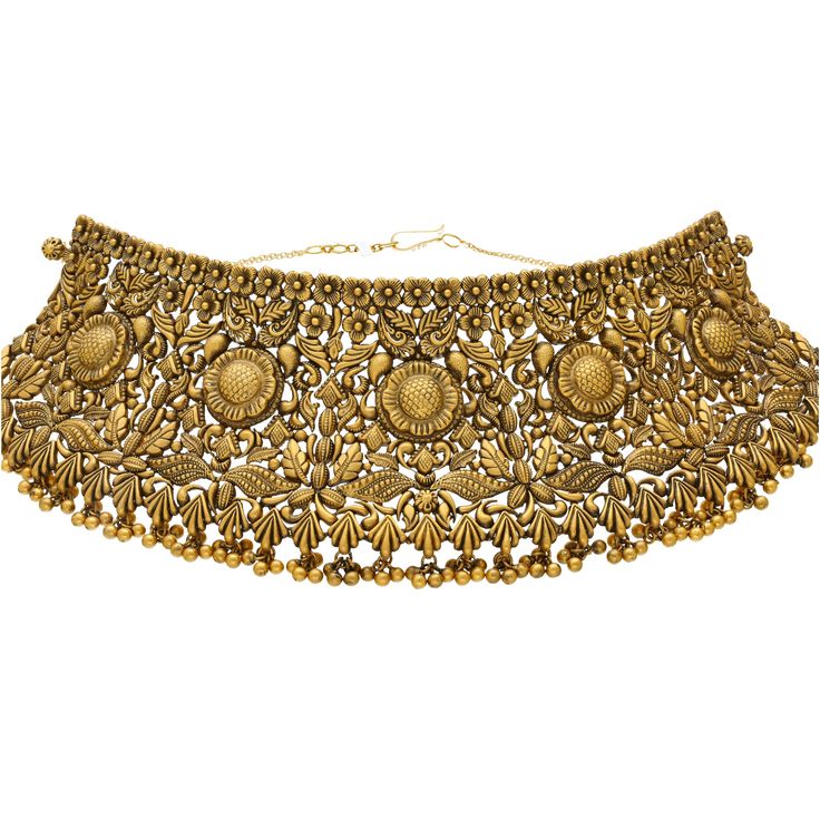 The engraved details used along this 22k Indian gold choker necklace and earring set adds an alluring look of rich texture. This stunning gold jewelry set is perfect for special events and occasions that call for the addition of antique Indian jewelry and cultural sophistication. Features • 22k yellow gold • Beading • Engraved details As a leading gold Indian jewelry store in the USA, we are proud to offer a wide selection of beautiful Indian gold jewelry, including this stunning 22k gold antiqu