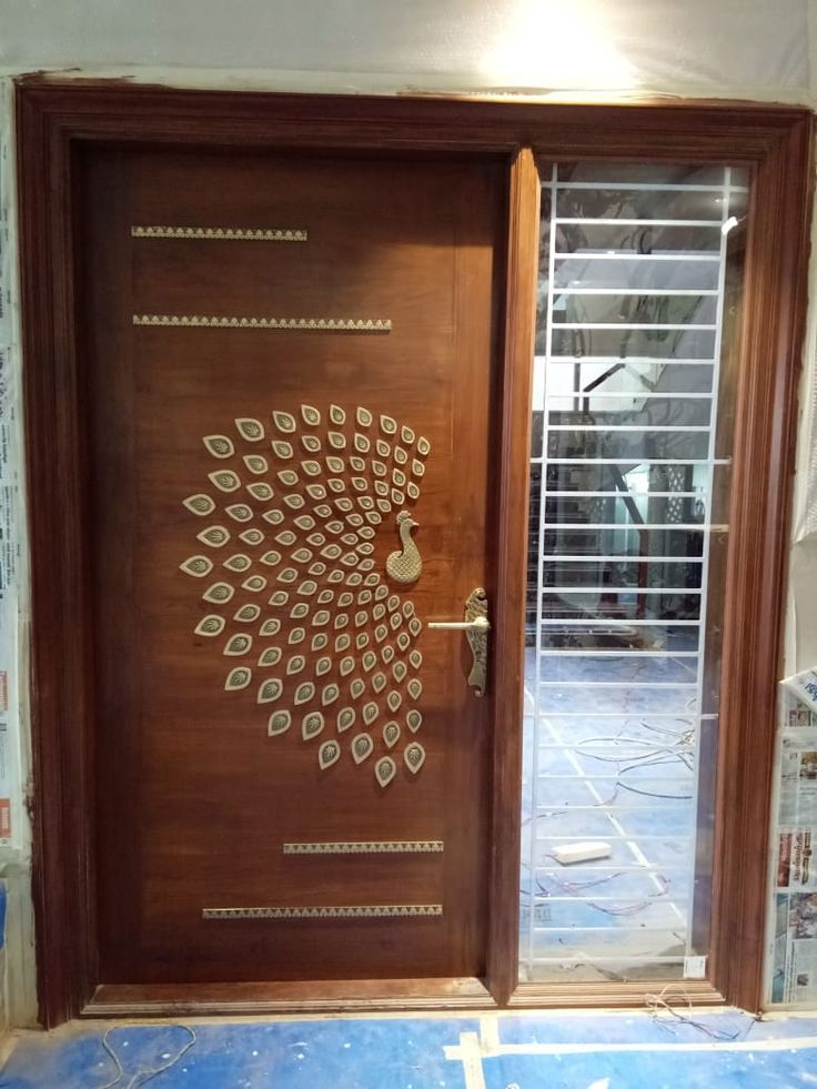 a wooden door with an intricate design on it