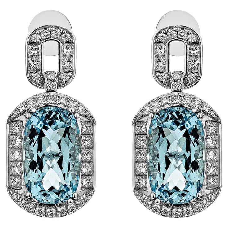 Presented an antique Aquamarine Drop Earring that is accented with White Diamond all around and enhances the beauty of the Earring. This Earring accented with Diamonds is made in White Gold, which looks very Elegant. Aquamarine Drop Earring in 18Karat White Gold with White Diamond. Aquamarine: 16.369 carat, 16.3X9.8mm size, Cushion shape. White Diamond: 1.705 carat, 2.10mm size, Princess shape, G color, VS clarity. White Diamond: 0.084 carat, 1.80mm size, round shape, G color, VS clarity. White Luxury Wedding White Topaz Diamond Earrings, Luxury Platinum Diamond Earrings Hallmarked, Luxury Platinum Blue Earrings, Luxury Pave Set Earrings For Formal Occasions, Luxury Pave Setting Earrings For Formal Events, Luxury Oval Earrings With Diamond Accents, Luxury Blue Platinum Earrings, Luxury Hallmarked Oval Diamond Earrings, Platinum Earrings With Pave Setting For Evening