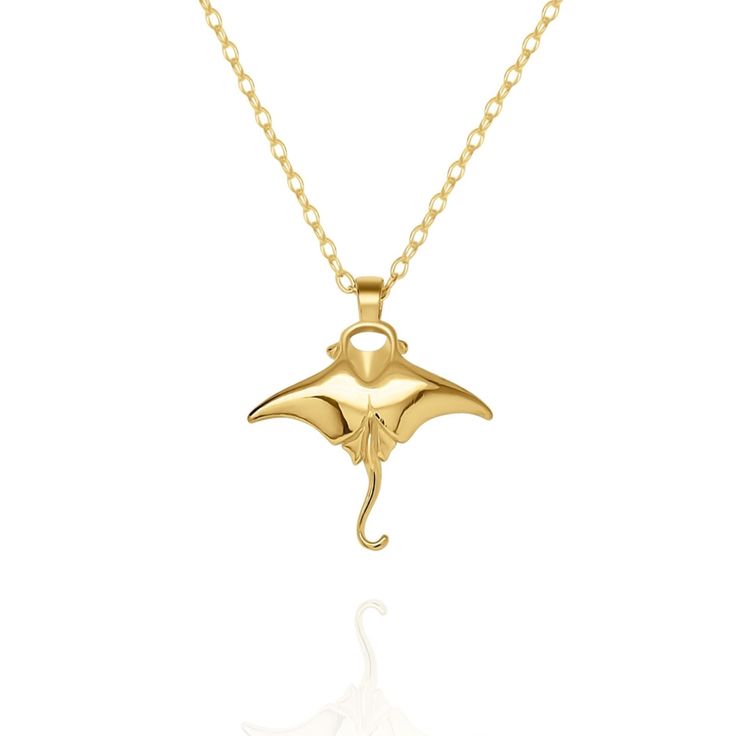 Gold vermeil Manta Ray charm pendant and chain. This charm measures 1.8cm in wide, which is 0.71 inches, and is hung from an 18” chain. It has been made using genuine gold vermeil. The correct definition of ‘Gold Vermeil’ is solid Sterling Silver that has been coated with a minimum of 2.5 microns of gold. Wearing a piece of Adrian Ashley’s jewellery identifies you as someone who can appreciate handmade goods and fine craftmanship. I do my best to insure all the raw materials I use have been sourced responsibly and I always price my work honestly. All pieces are handmade in a small workshop in the English countryside and shipped to collectors across the world. Please read my shop policies before ordering. Chic Casual Outfits, Manta Ray, Charm Necklace Silver, Small Charms, Jewelry Lookbook, Chic Casual, Small Pendant, Jewelry Inspo, Dream Jewelry