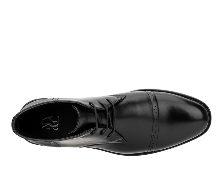 The Kevin Chukka boot is an elegant and timeless choice for the colder months. Featuring a cap toe, brogue detail and lace-up closure, this style can be easily dressed up or down to go with a variety of outfits. Faux Leather upper, Lace up closure for secure fit,1.5\ stacked heel, Round Cap toe, Nylon Mesh footbed, Rubber outsole | Men's New York and Company Kevin Chukka Dress Boot in Black Size 10 Dress Boots Black, Outfits New York, Dress Boot, Mens Dress Boots, Chukka Boots Men, Chukka Boot, Dress Boots, New York And Company, Shoe Carnival