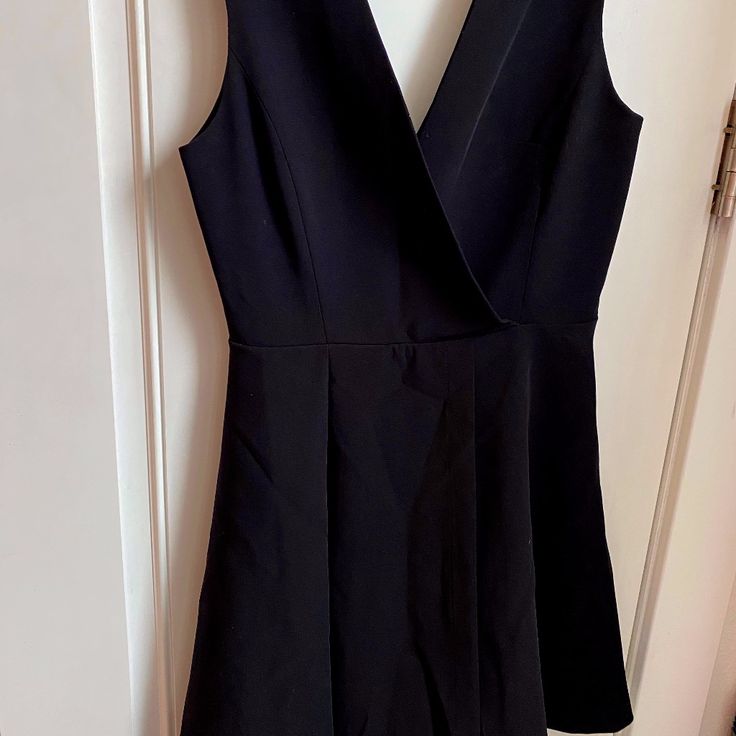 This Black Crepe Dress Has A Beautiful Deep Plunge V-Neck (Designed To Be Open Between Breasts (Closing At End Of Sternum/Top Of Diaphragm) And A V-Back. It Has A Gorgeous Layered Swing Skirt. It Is A Flattering Bodice And Breastbone- It Also Nicely Drapes To Cover And Hide Waist, Below Belly Button. The Weight Of The Skirting Keeps The V Plunge In Place. I Think This Dress Is Timeless As An Lbd A La Audrey Hepburn- I Just Don’t Have A Pretty Lady Place To Go These Days. Black Crepe Dress, Below The Knee Dresses, Fuschia Dress, Mini Dress Hot, Blazer Mini Dress, Classic Black Dress, Deep V Neck Dress, Blue Sleeveless Dress, Deep Plunge